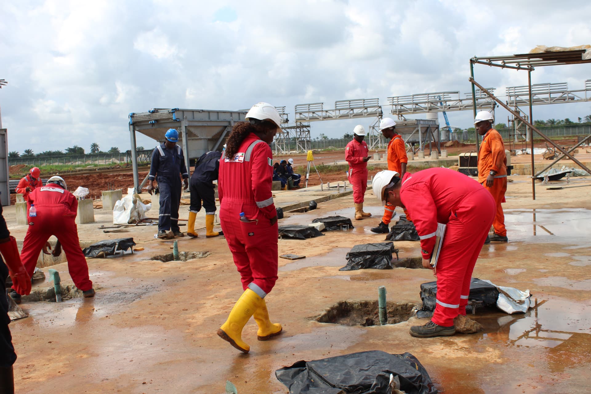 Site team and client engineers supervising grouting works at ANOH gas plant