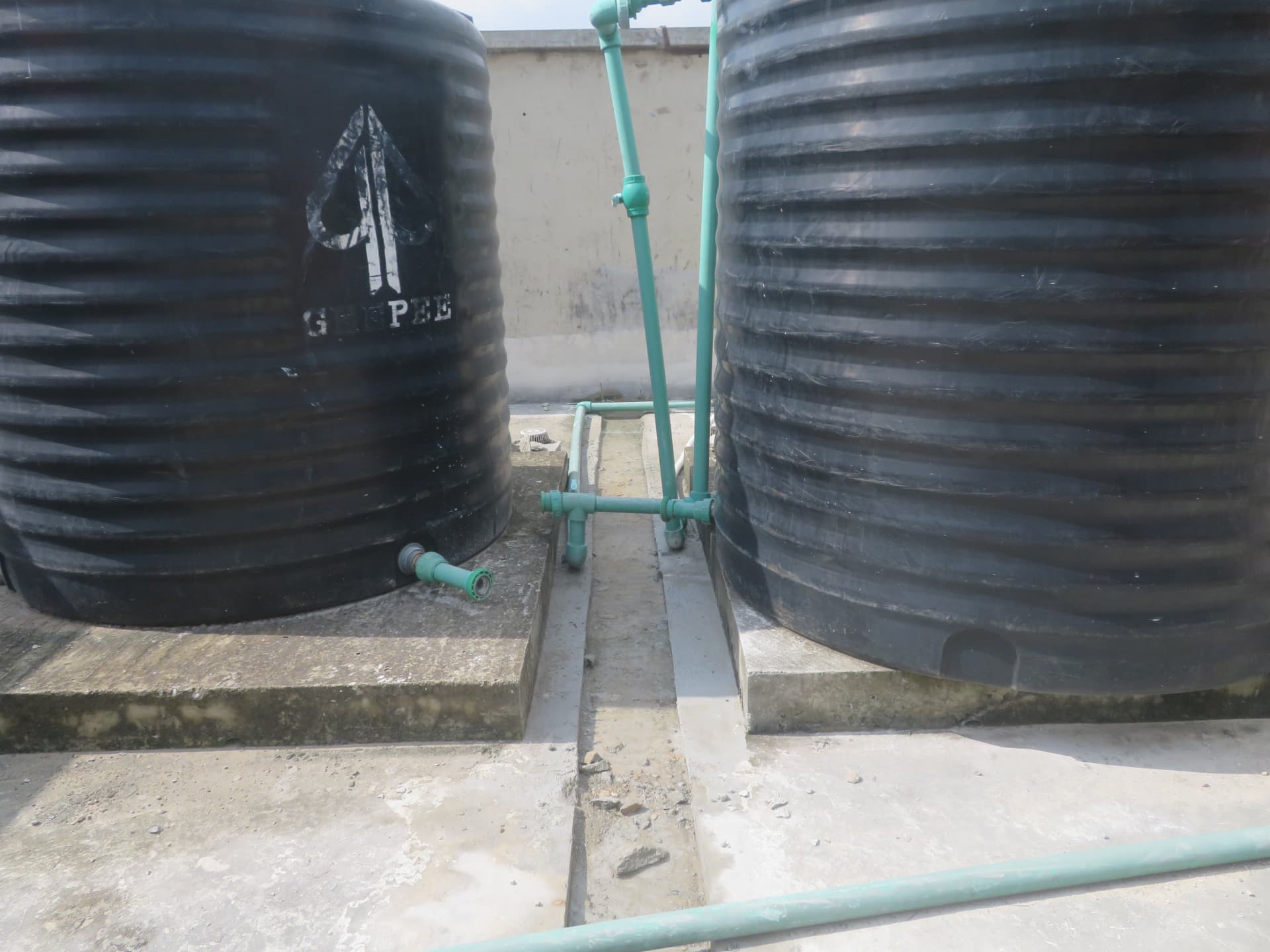 Rooftop water tanks and slab area within the works zone