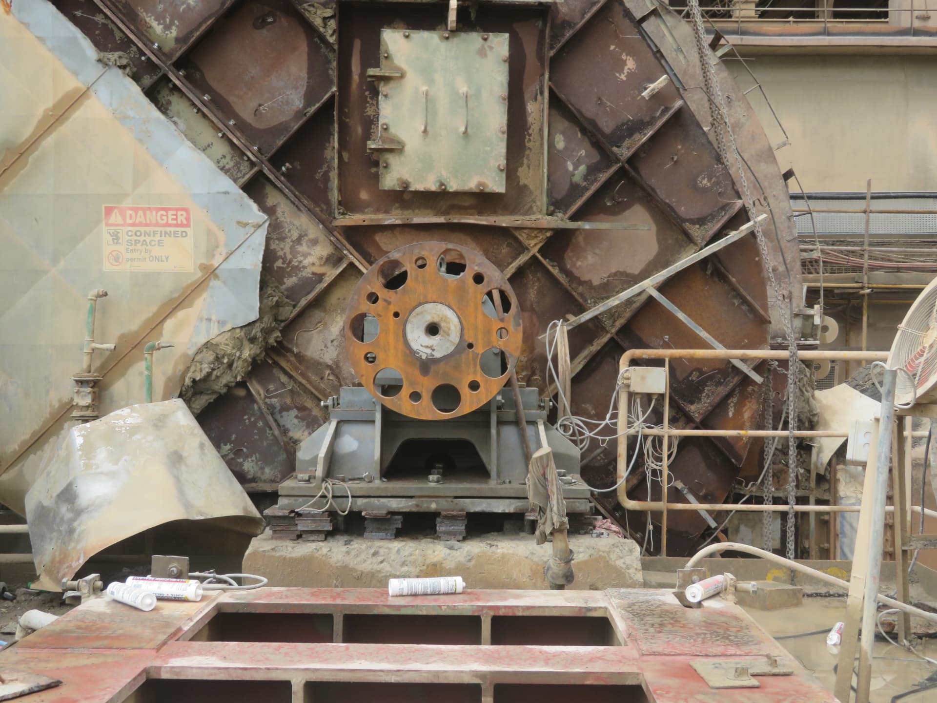 Machine base on levelling packs above the concrete plinth
