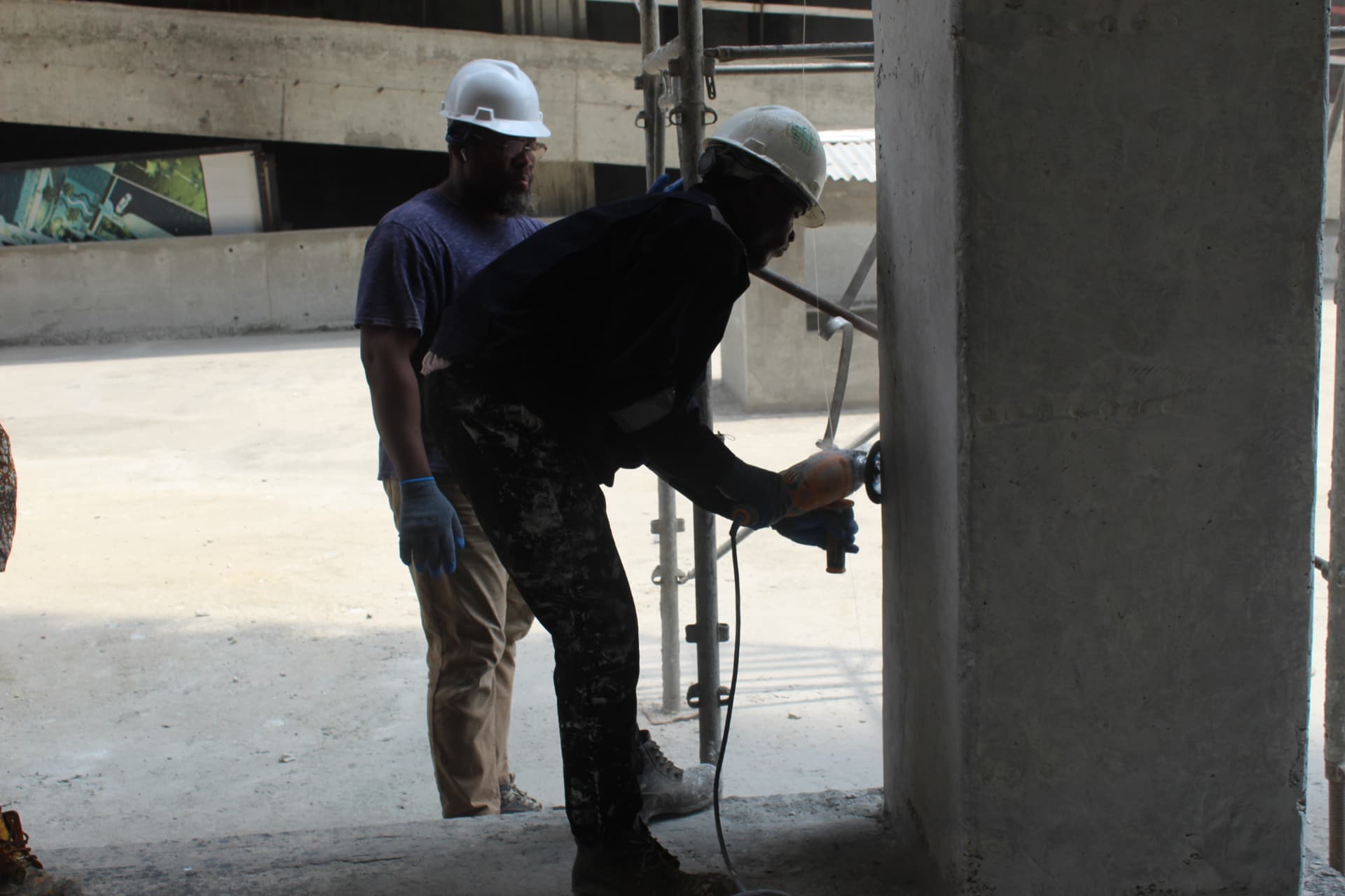 Grinding the column surface ahead of FRP wrapping