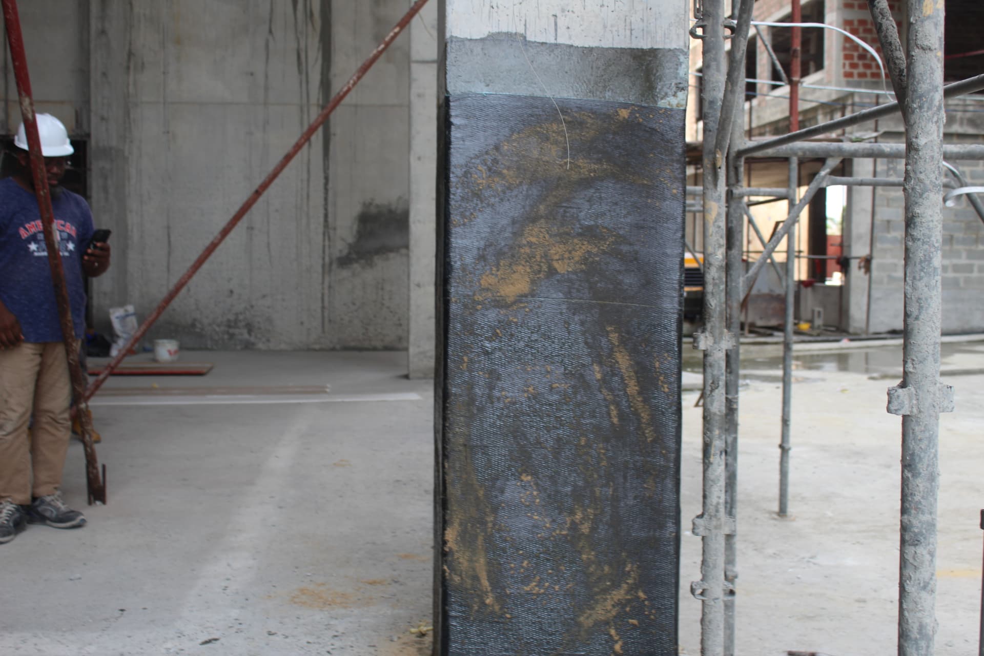 Completed FRP carbon wrapping to a reinforced concrete column