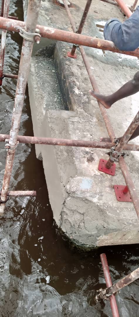 Rendered jetty beam section viewed through the access scaffold