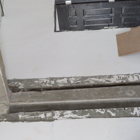 Prepared beam and column faces after removal of defective concrete