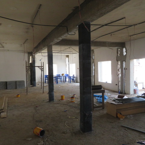 Wrapped and finished columns across the station floor plate