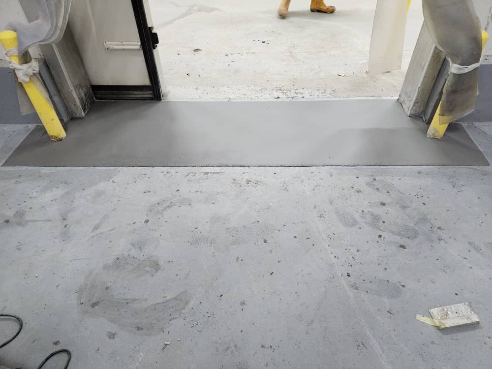 Cold room doorway joint after fresh screed placement