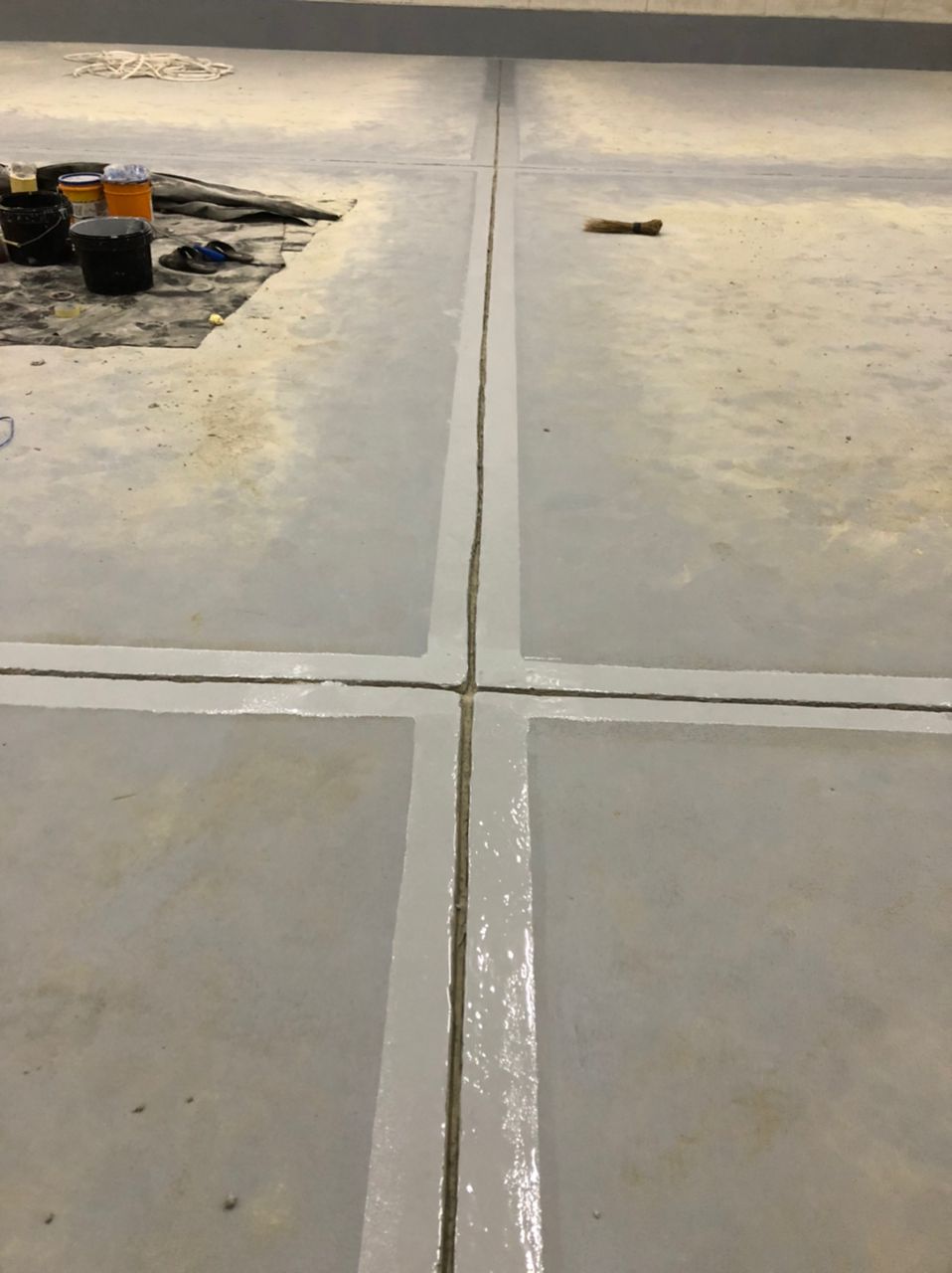 Sealed floor joints crossing the finished warehouse slab