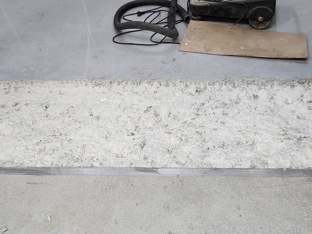 Reinstated concrete panels at the cold room threshold